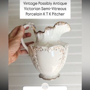 Elegant White and Gold Pitcher